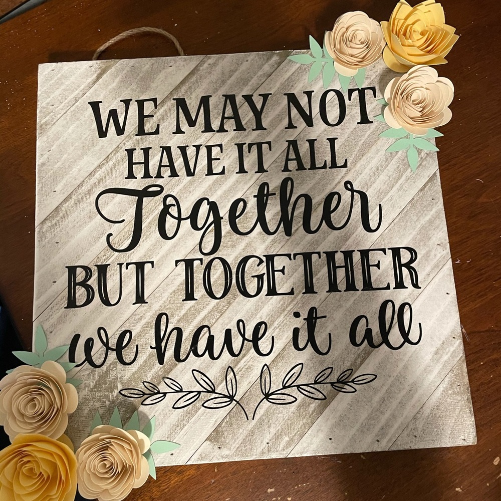 Wooden sign custom made with paper flowers.